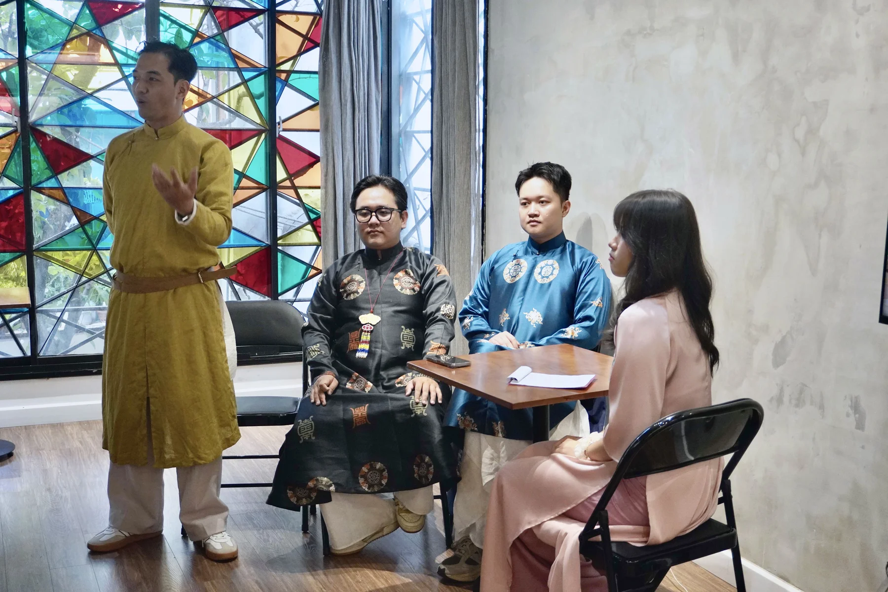 Conversations about Vietnamese historical dress at Nếp Áo Nước Nam.